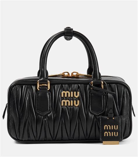 Mytheresa miumiou handbags